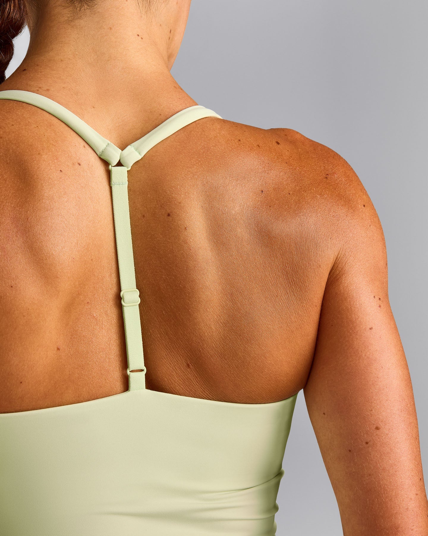 UnifiedMove™ T Back Mid Tank Top with Built in Bra Shelf New Branding | Meadow Mist Green