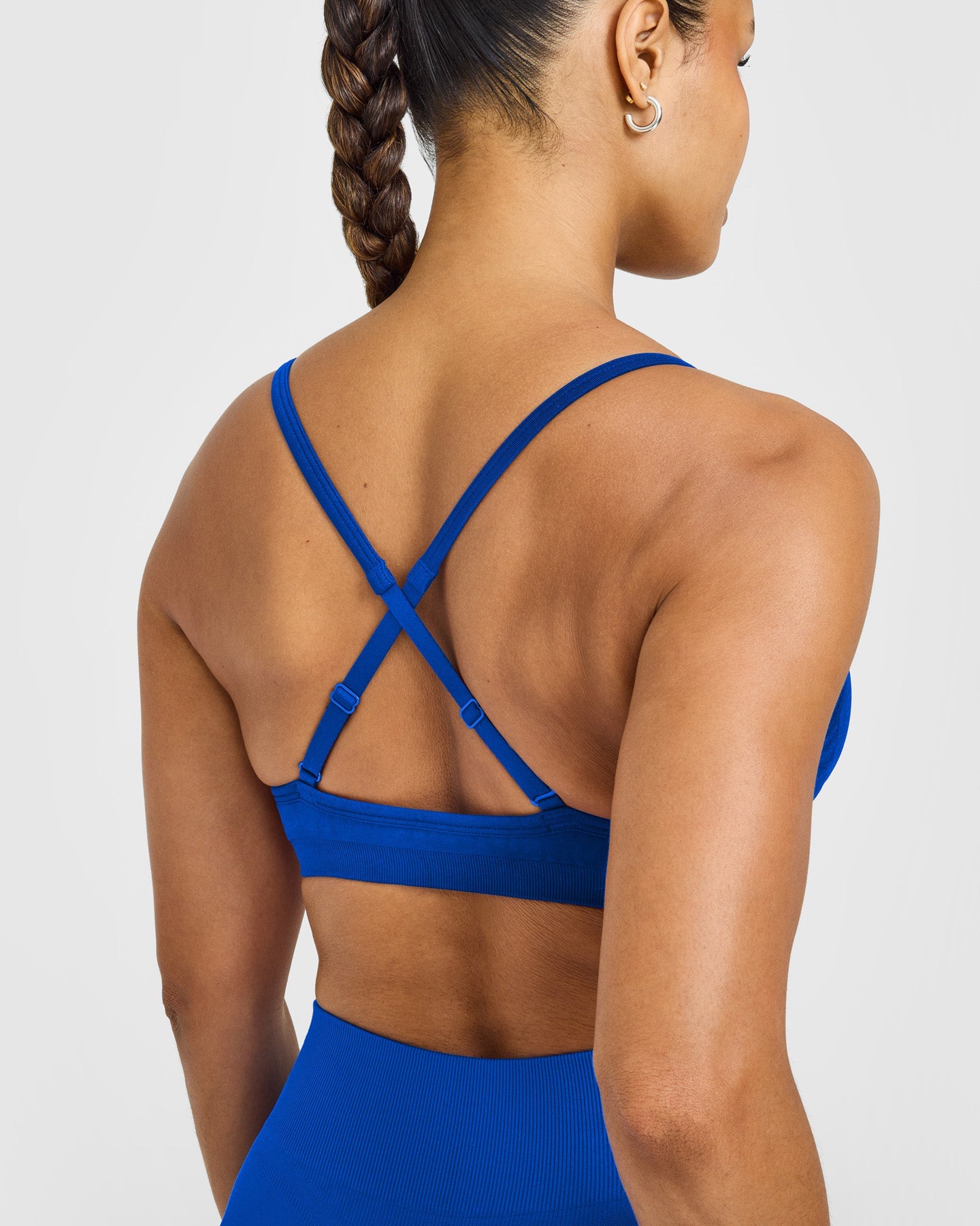 EnhanceLift™ Seamless Strappy Sports Bra with White Logo | Cobalt Blue
