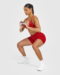 EnhanceLift™ Seamless Strappy Sports Bra with White Logo | Light Toasted Red