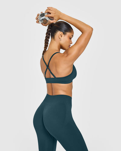 EnhanceLift™ Seamless Strappy Sports Bra with White Logo | Washed Oil Blue