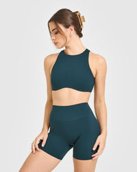 SoftMotion™ High Neck Sports Bra with White Logo | Oil Blue