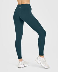 SoftMotion™ High Waisted Leggings with White Logo | Oil Blue