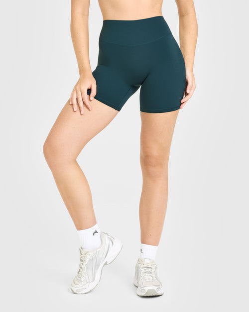 Oner Modal SoftMotion™ High Waisted Shorts 6" with White Logo | Oil Blue