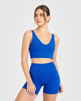 SoftMotion™ Longline Sports Bra with White Logo | Light Cobalt Blue