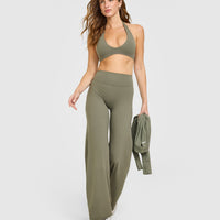 SoftMotion™ Minimal Halter Neck Bralette with White Logo | Alpine Green