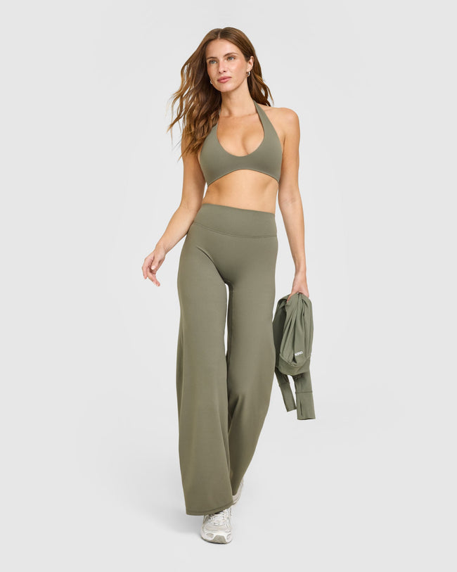 SoftMotion™ Minimal Halter Neck Bralette with White Logo | Alpine Green