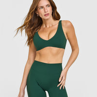 SoftMotion™ Scoop Back Bralette with White Logo | Dark Racing Green