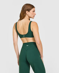 SoftMotion™ Scoop Back Bralette with White Logo | Dark Racing Green