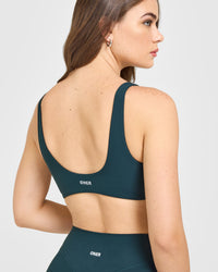 SoftMotion™ Scoop Back Bralette with White Logo | Oil Blue