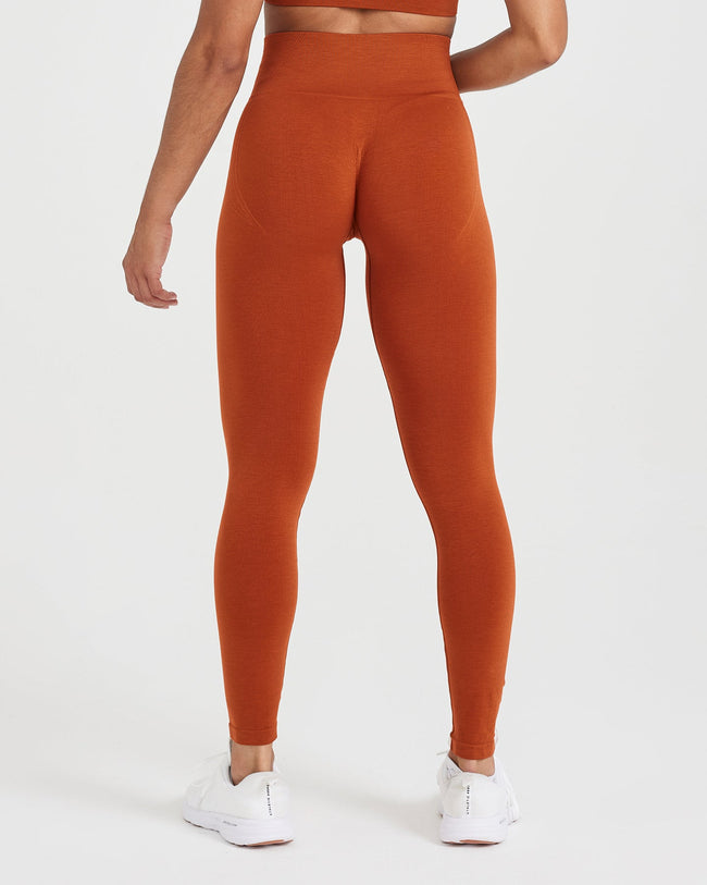 Savvi Fit Trainer leggings rust color, laser cut details size XS worn once