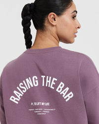 Raising The Bar Graphic Unisex Long Sleeve Top | Vintage Purple