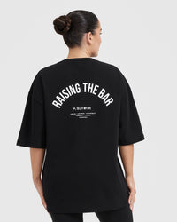 Raising The Bar Graphic Unisex T-Shirt | Black