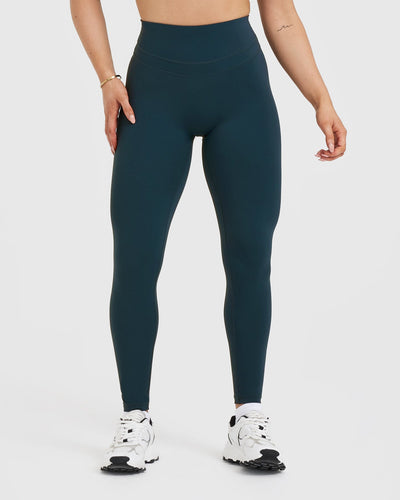 https://us.oneractive.com/cdn/shop/products/UNIFIED_HIGH_WAISTED_LEGGING_OIL_BLUE_01_400x.jpg?v=1707213316